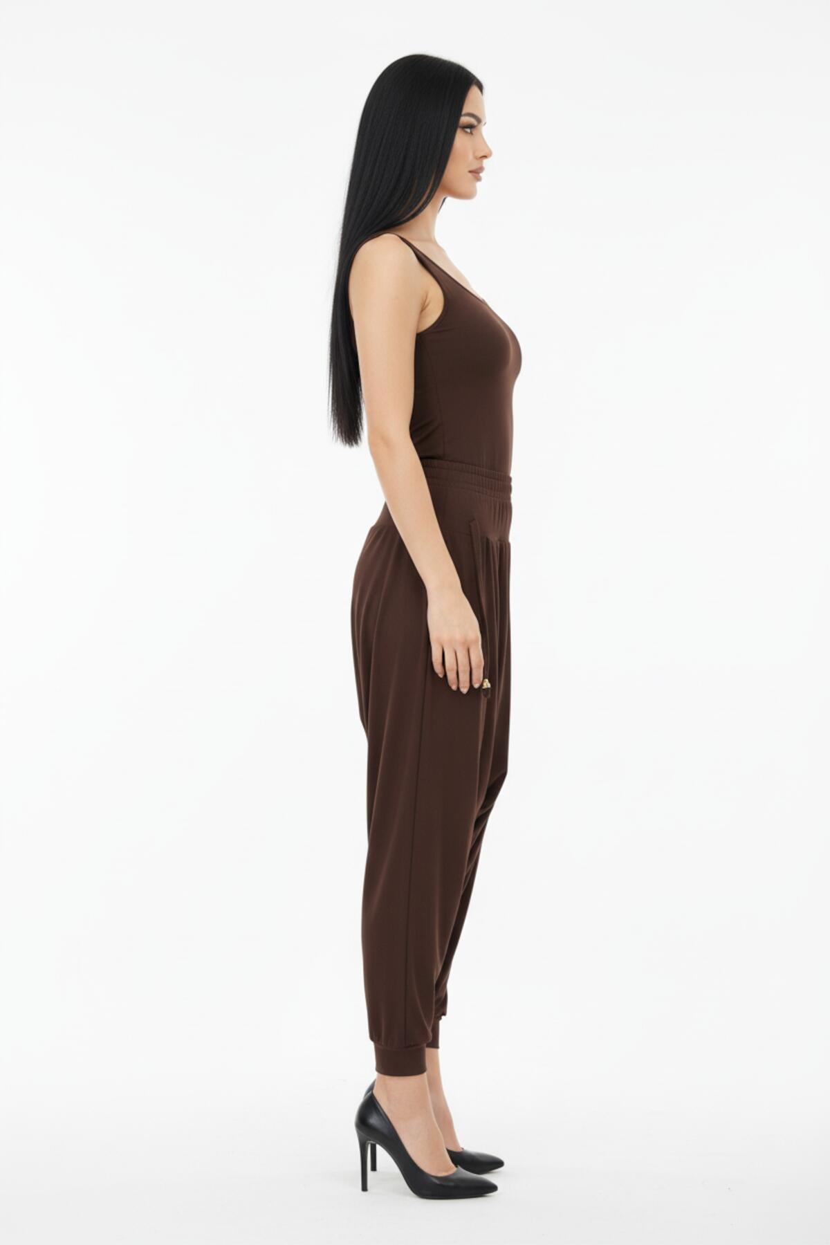 Sandy Broek, Grote Maten — Bruin